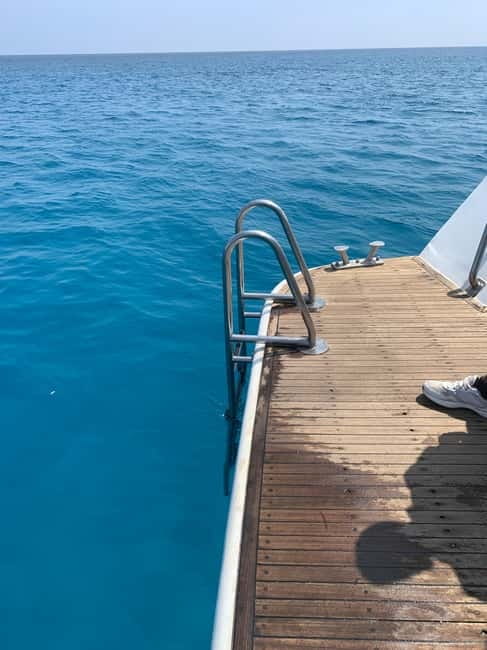 Protaras: 80s and 90s Sunset Cruise with Cypriot Dinner & DJ - Cape Greco sights from the water