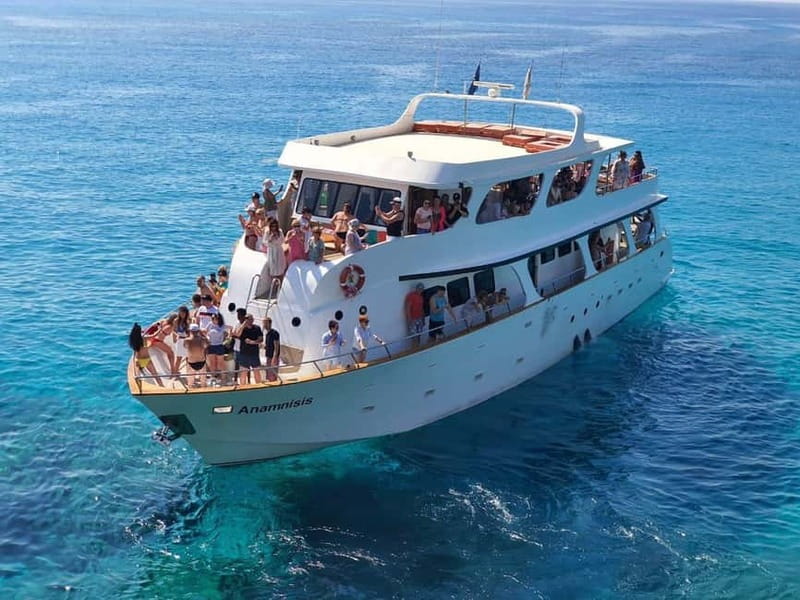 Protaras: 80s and 90s Sunset Cruise with Cypriot Dinner & DJ - Green Bay, Turtle Bay, and the swim stops