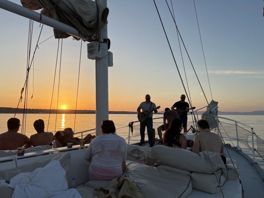 Rhodes: Sunset Cruise with Open Bar, Dinner, & Live Music - What to bring for a smoother evening