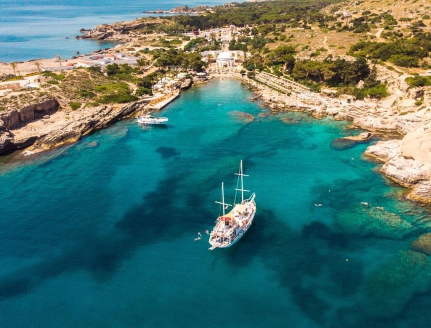 Rhodes: Sunset Cruise with Open Bar, Dinner, & Live Music - Cruising past Rhodes’ east coast