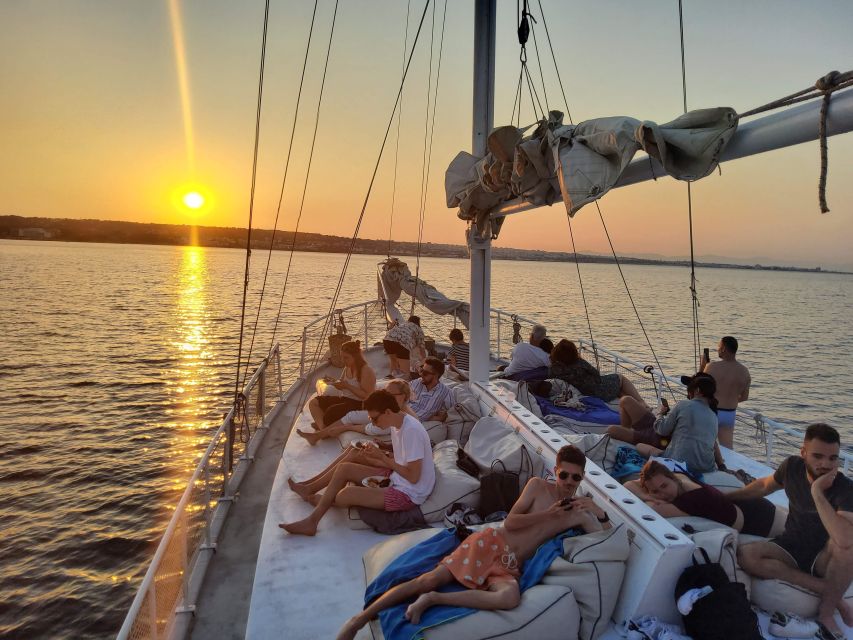 Rhodes: Sunset Cruise with Open Bar, Dinner, & Live Music - Sunset, moonrise, and live music on the way back