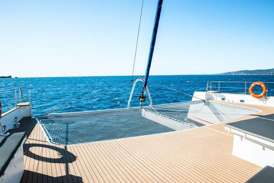 Saint-Raphaël : Sunset & Dinner Cruise to the Golden Island - The anchorage: paddleboards, aperitif, and open water