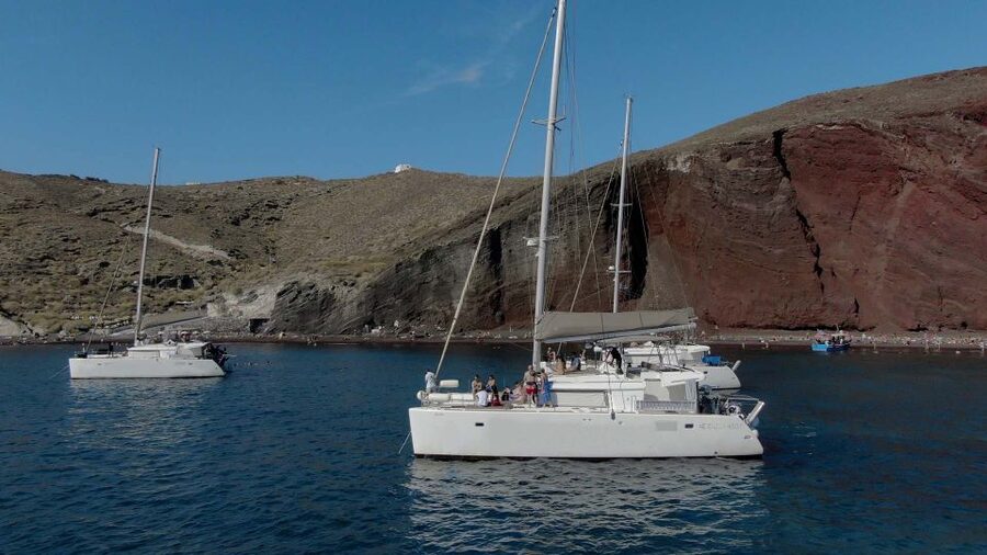 Santorini: Sunset Cruise with Greek Dinner and Transfer - Key points to know before booking