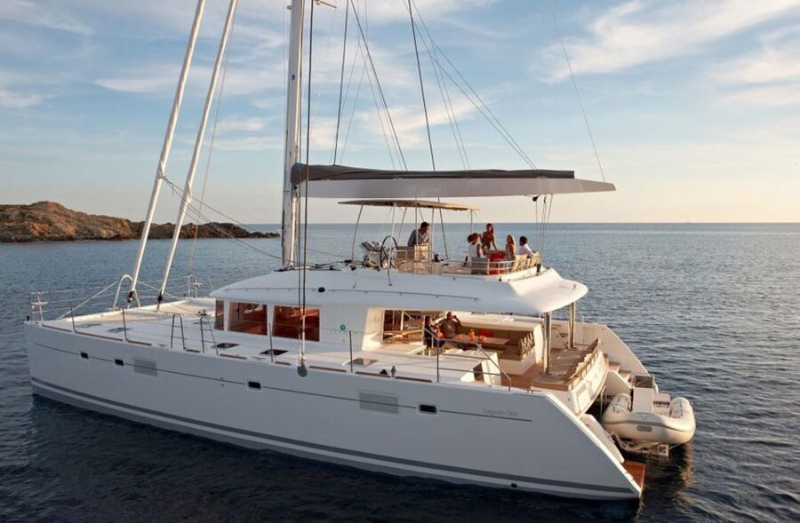 Santorini: Sunset Cruise with Greek Dinner and Transfer - Volcanic waters near Nea Kameni and Palea Kameni