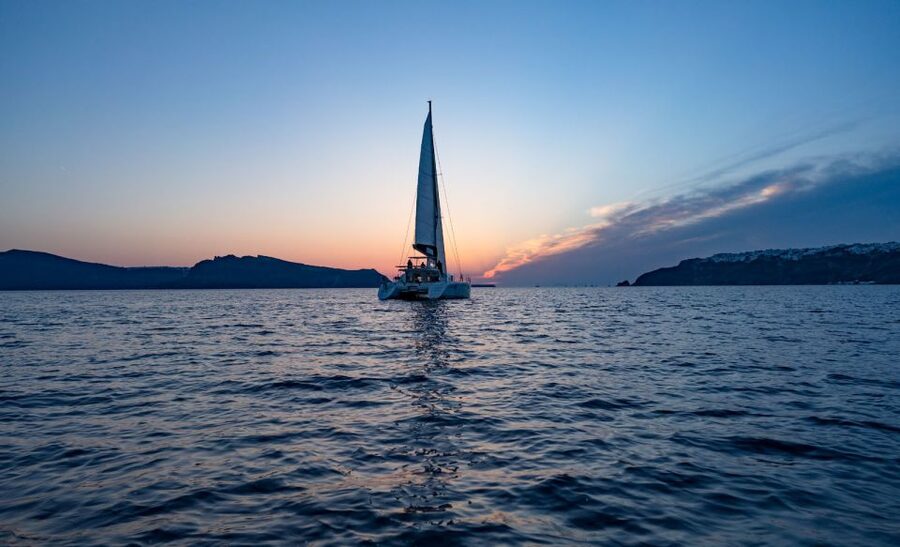 Santorini: Sunset Cruise with Swim Stops, Dinner, and Drinks - The volcanic hot springs stop