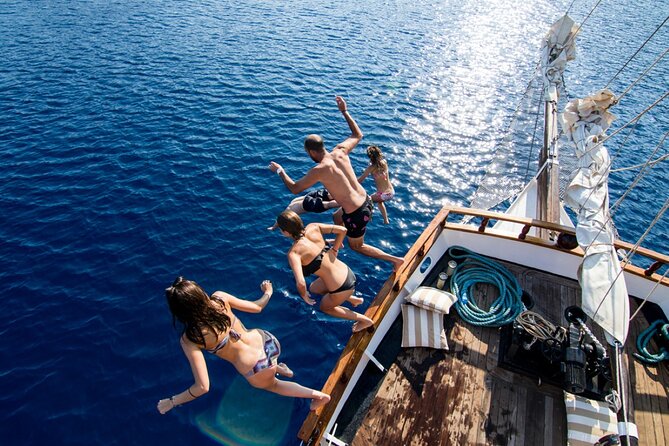 Santorini Sunset Dinner Cruise Including Nea Kameni Visit - Nea Kameni: a hot, rough walk on volcanic ground