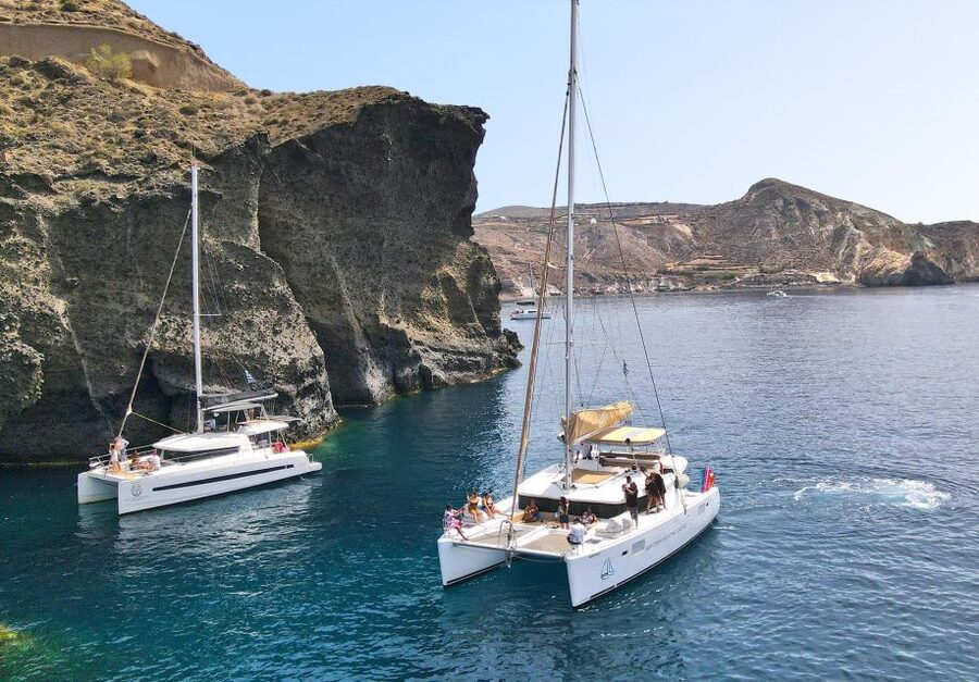 Santorini: Sunset Sailing Cruise, with Dinner and Drinks - Entering the caldera and the Nea Kameni hot springs