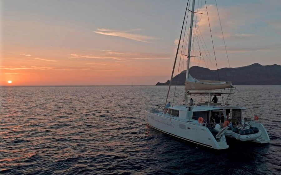 Santorini: Sunset Sailing Cruise, with Dinner and Drinks - Mesa Pigadia, snorkeling, and dinner onboard