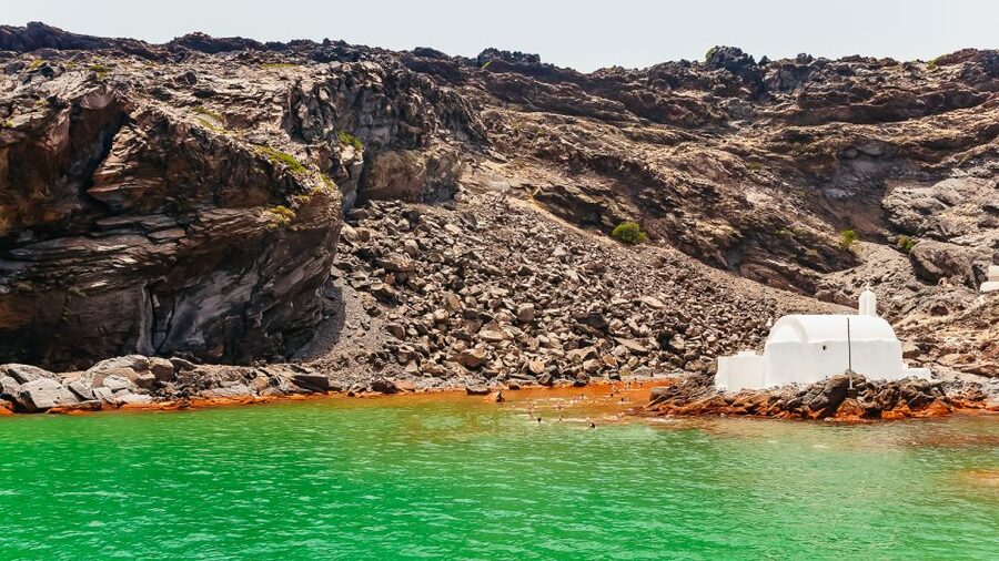 Santorini: Volcano and Hot Springs Sunset Dinner Cruise - Pickup, timing, and the return trip