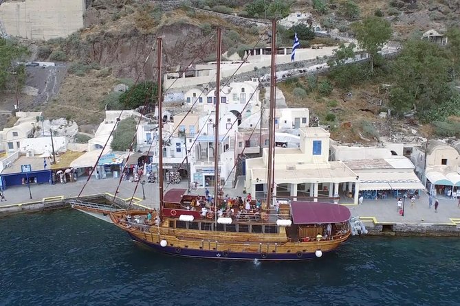 Santorini Volcano Sunset Cruise with Dinner - Thirassia brings food and a slower pause