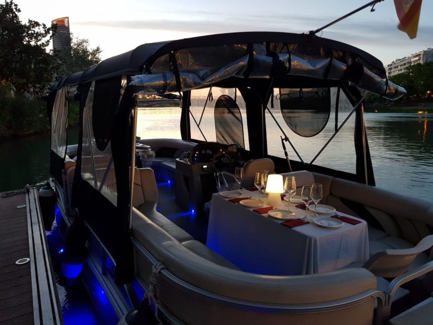 Seville: Private Boat Tour with Paella Lunch and Drinks - Boarding near Triana Bridge