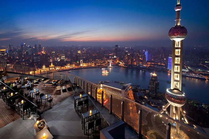 Shanghai Authentic Dinner and Night River Cruise with Rooftop Bar Hopping Option - Starting with soup dumplings and a local meal