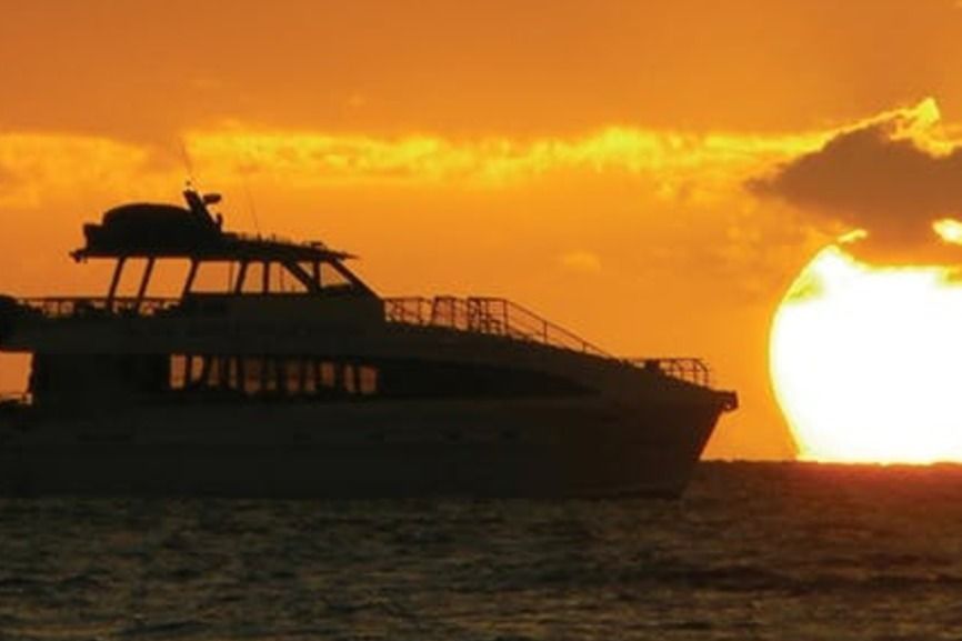South Maui: Sunset Cruise with 4-Course Dinner and Drinks - The catamaran ride across Maalaea Bay