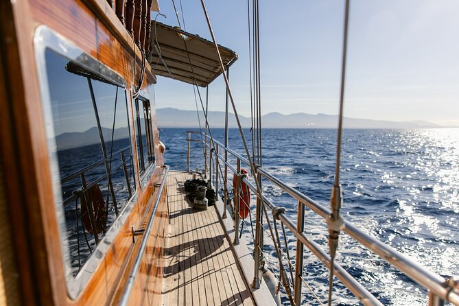 Sunset Dinner Cruise: Sunset, Swim, Drinks, and Dinner Onboard - Sunset views from the Athens Riviera