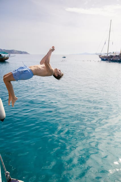 Sunset Dinner Cruise: Swim Stop, Drinks & Onboard Dining - Key points at a glance