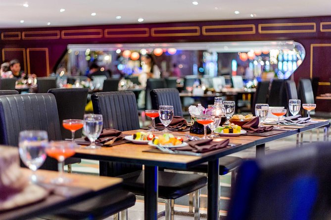 The White Orchid: Chao Phraya Dinner Cruise Experience - Bangkok’s riverfront after dark