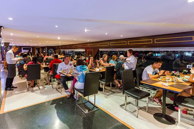 The White Orchid: Chao Phraya Dinner Cruise Experience - Rain, photography, and deck choice