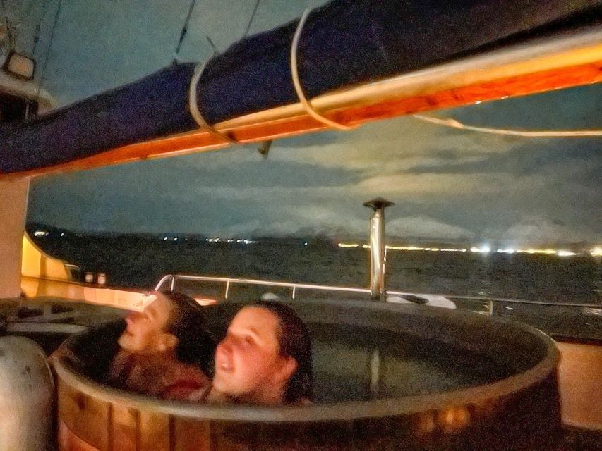 Tromso: Luxury Northern Lights Cruise with Hot Tub & Dinner - Watching the aurora from the decks